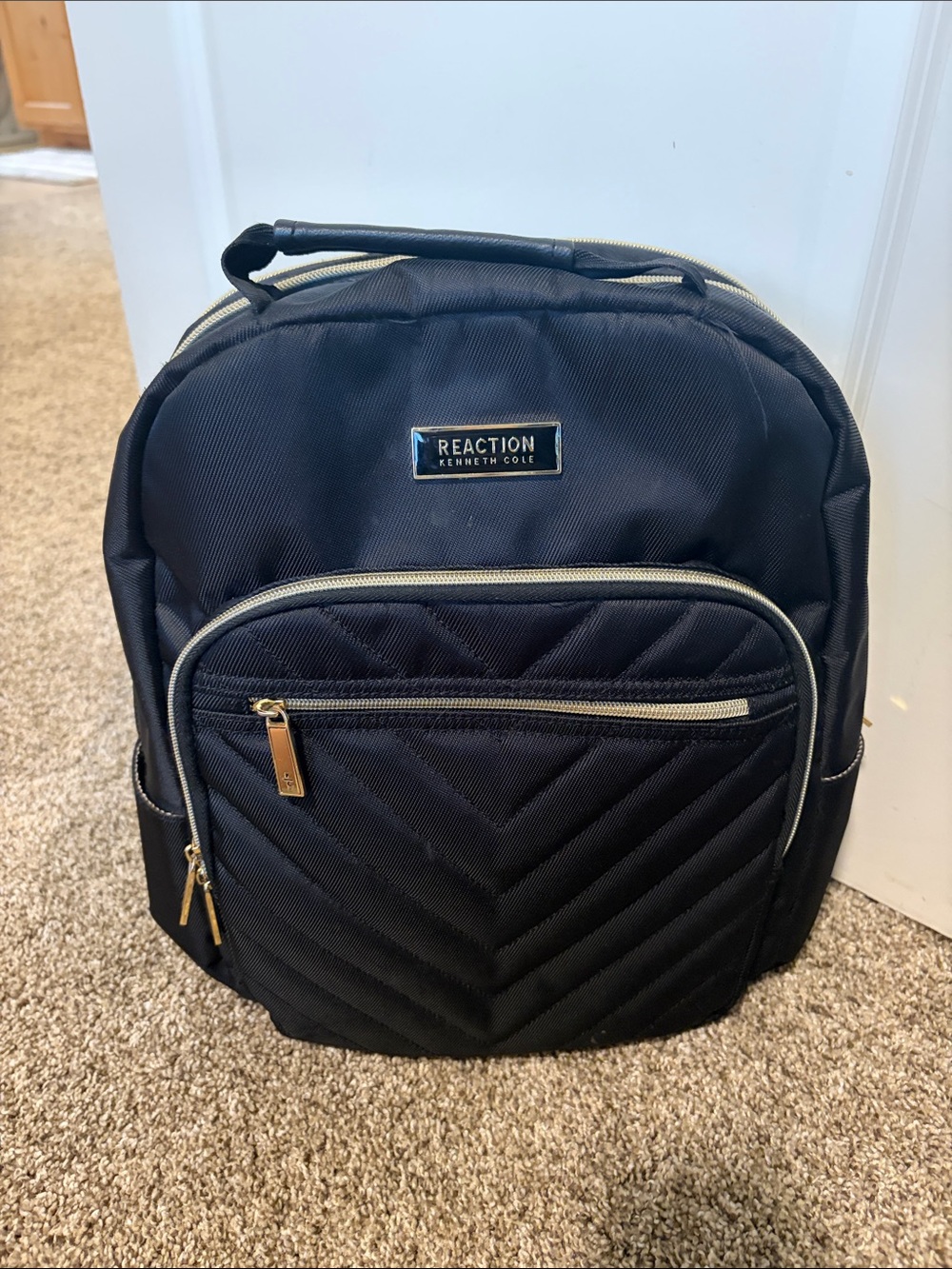 Reaction Kenneth Cole Black Quilted Backpack with Gold Accents